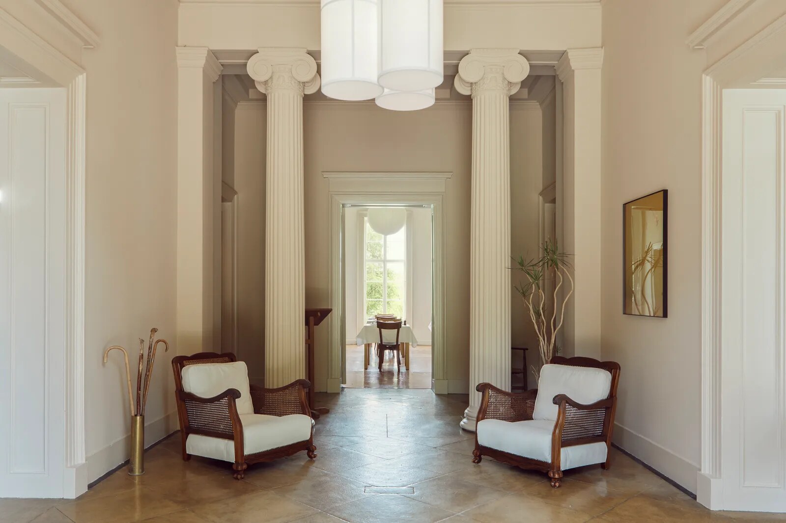Boath House — the columned entrance hall with cane armchairs