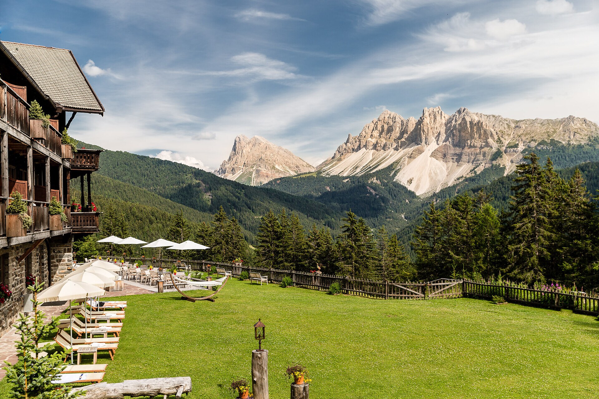 Forestis, Dolomites — a sun-lounger terrace beneath the peaks