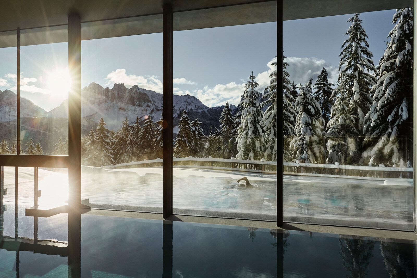 Forestis — the indoor pool wrapped in glass above the Dolomites