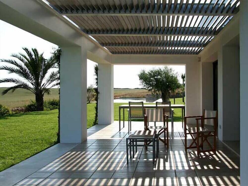 Biniguas Vell &mdash; the pergola dining terrace over the fields