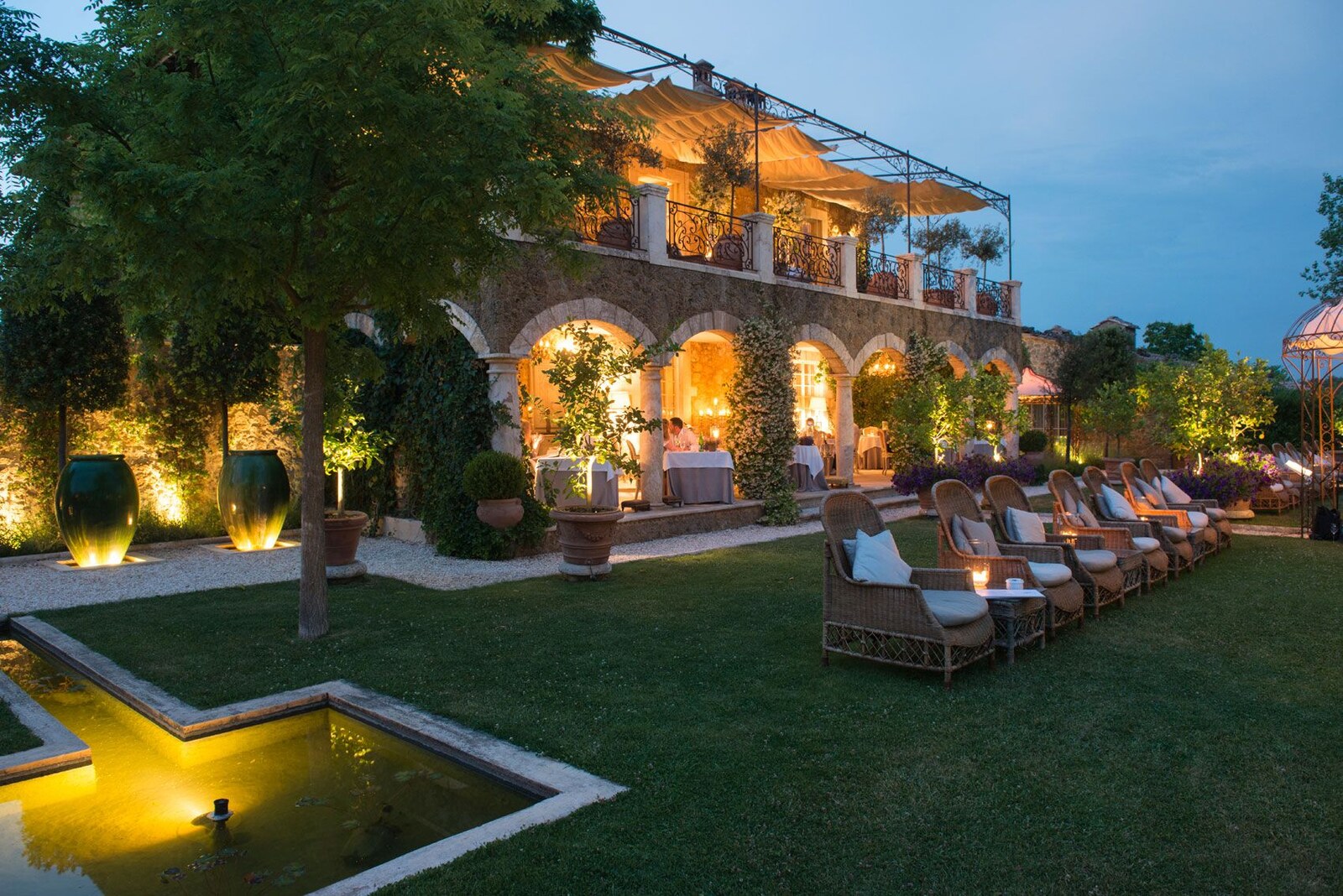 Borgo Santo Pietro &mdash; the gardens lit at dusk
