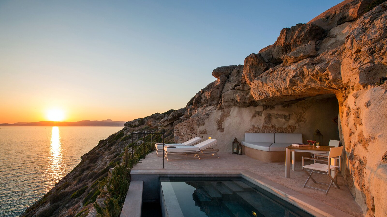 Cap Rocat &mdash; a private pool above the sea at sunset