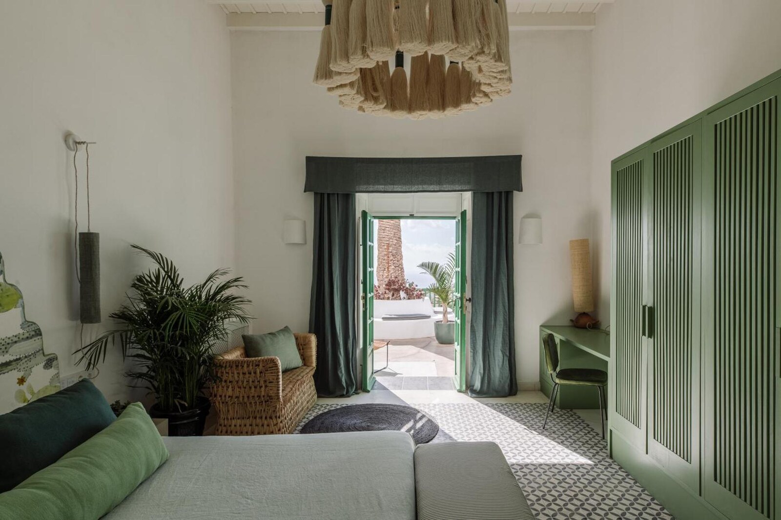 C&eacute;sar Lanzarote &mdash; a sitting room beneath a woven pendant