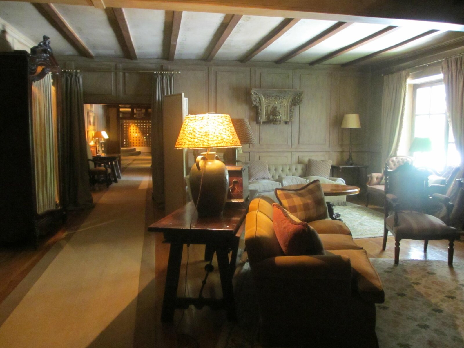 Hotel Landa &mdash; the panelled sitting room with antiques