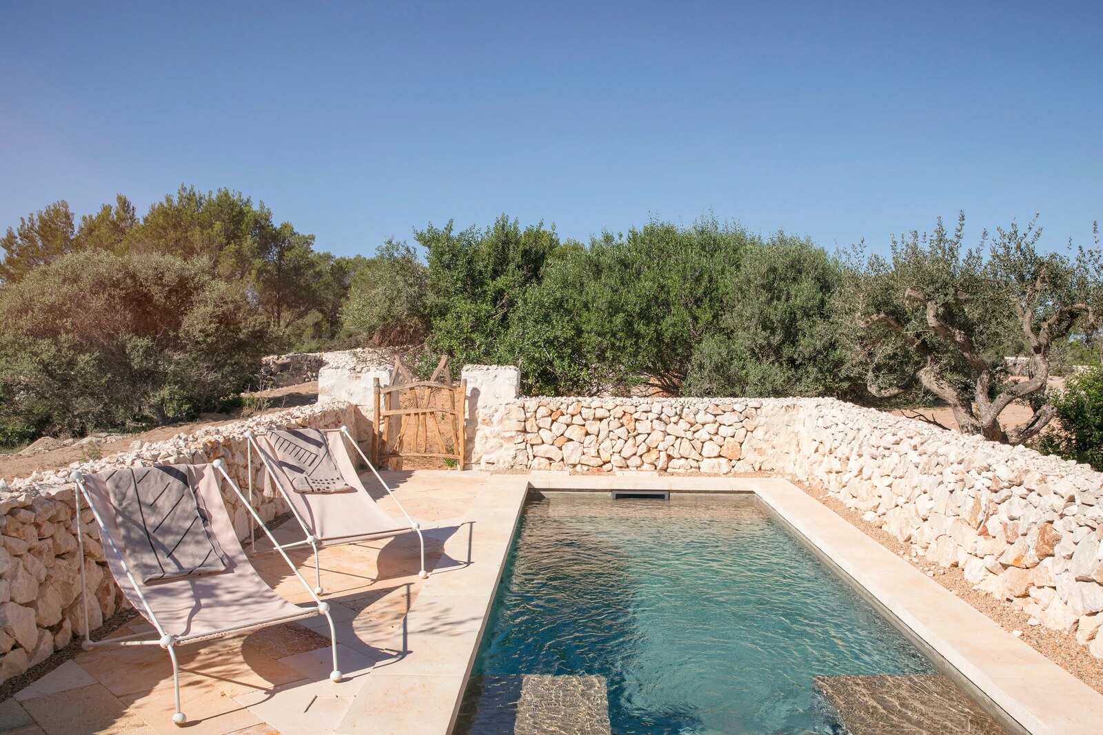 Menorca Experimental &mdash; the pool against the dry-stone wall
