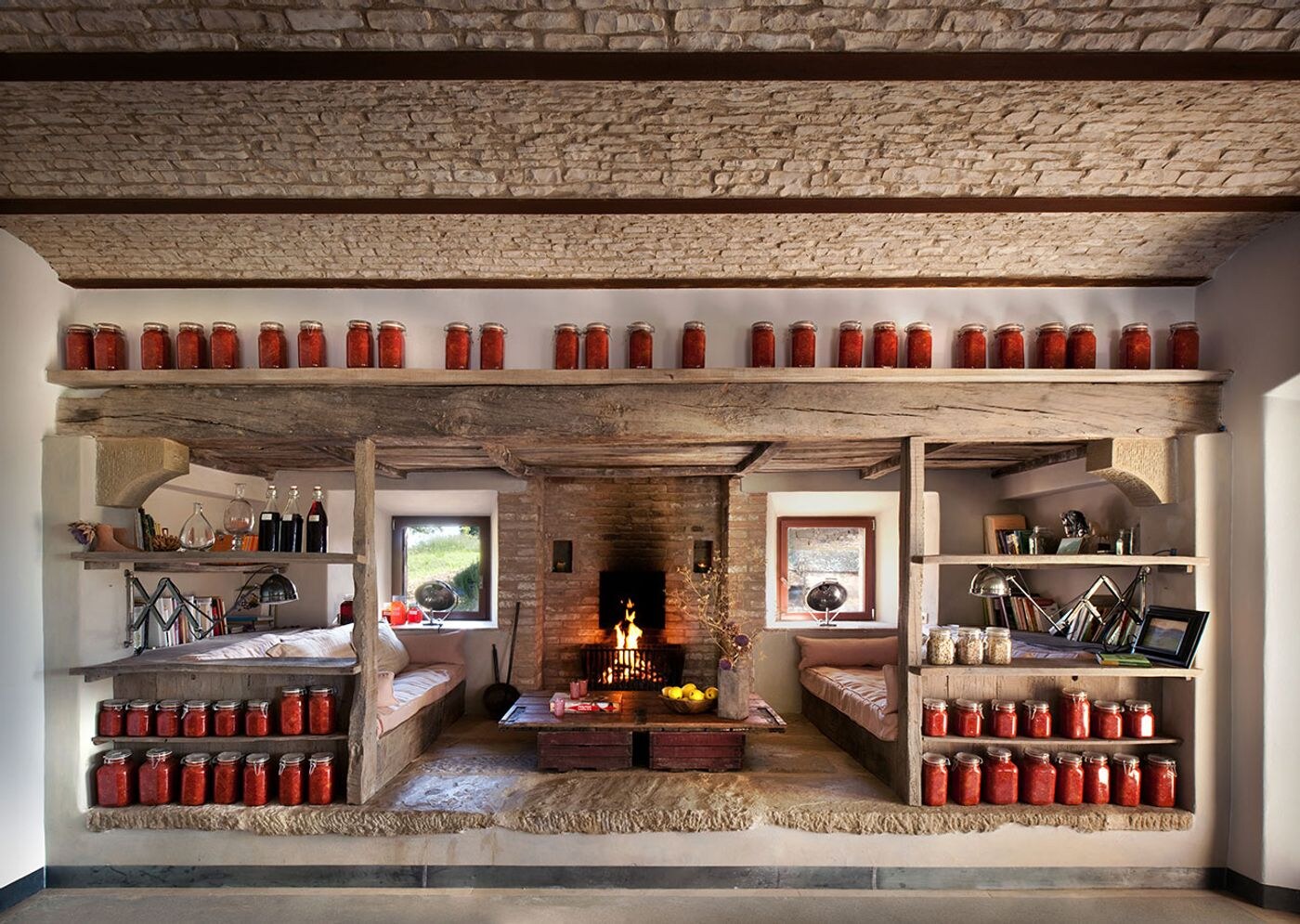 Reschio &mdash; a study lined with shelves in the castle's earthy palette