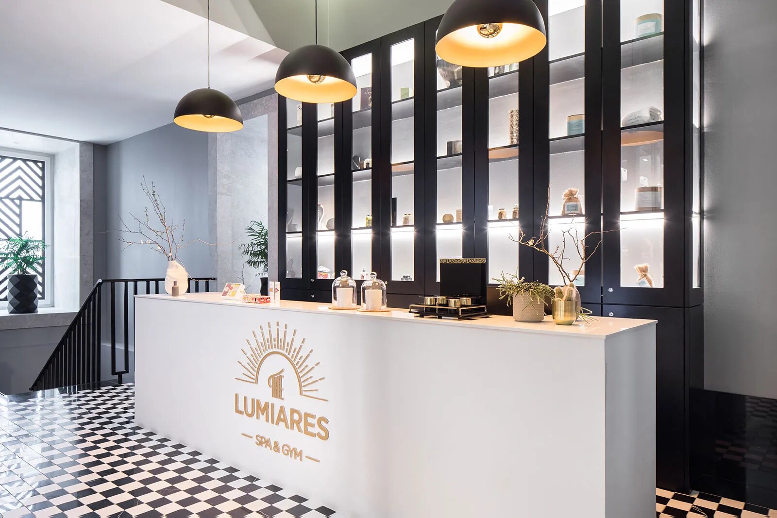The Lumiares &mdash; the reception, beneath the hotel&rsquo;s emblem