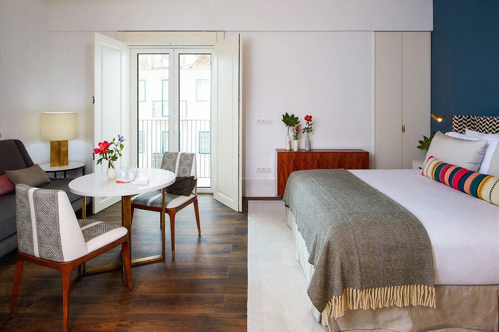 The Lumiares &mdash; a studio with a fitted kitchen and a deep blue wall