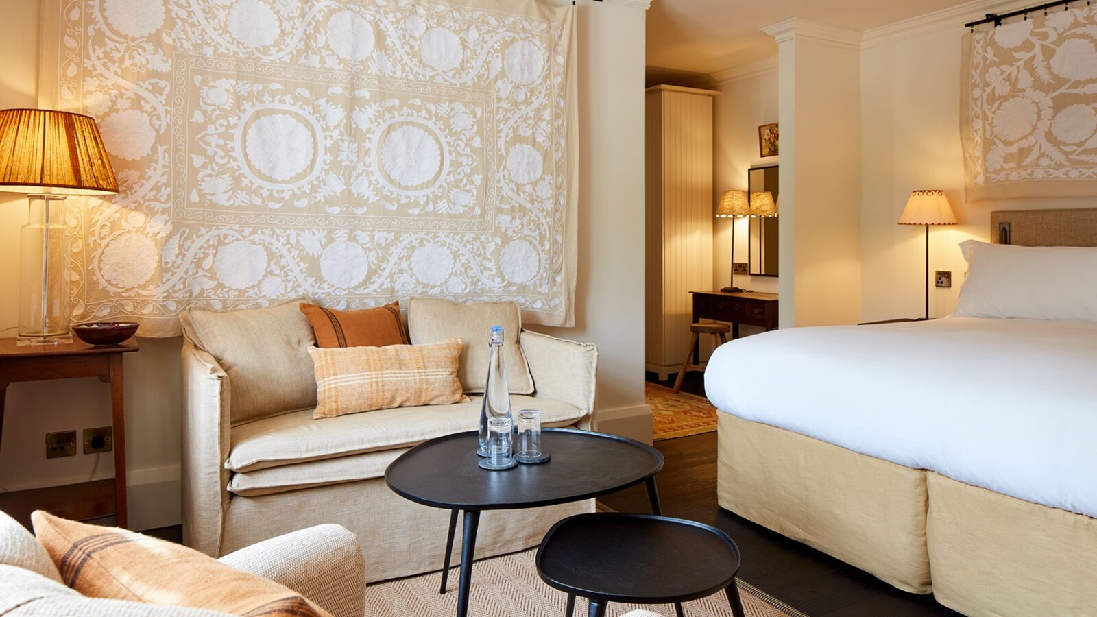 The Grove of Narberth — a suite with antique textiles and soft lamplight