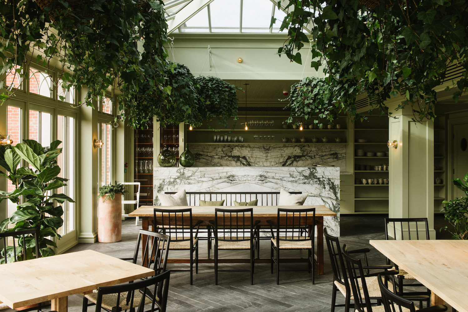 The plant-filled orangery dining room