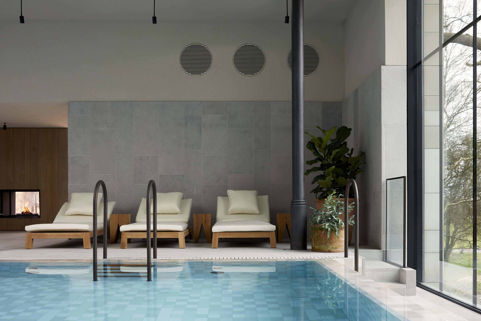 Loungers beside the pool at The Bothy spa