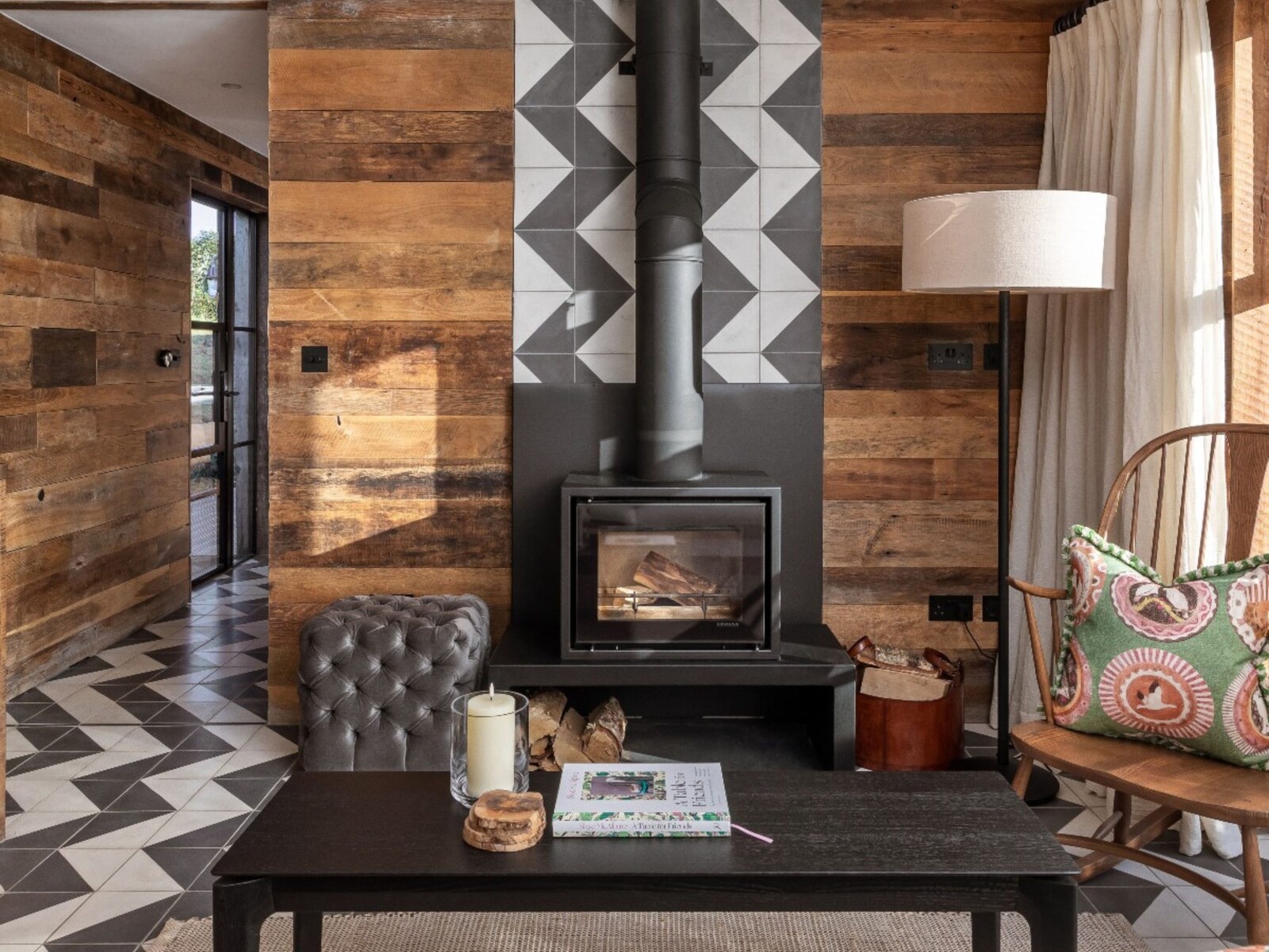 Louma — a snug with a wood-burning stove and reclaimed timber
